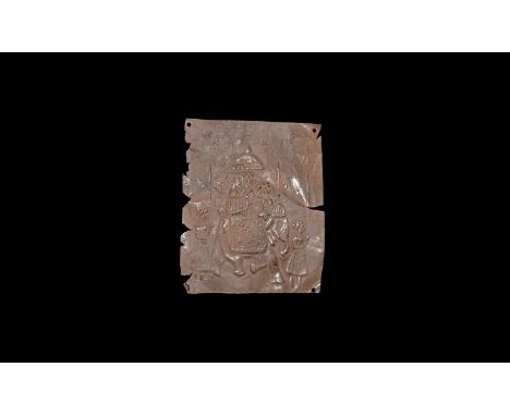 19th century AD. A silver plaque embossed with a scene of an elephant with canopy to the back with man smoking a pipe under a