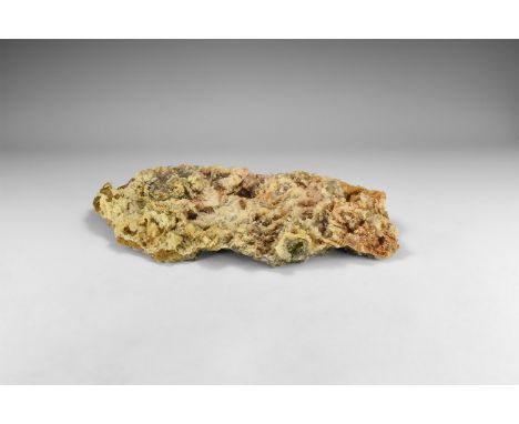 A large sheet of calcite crystals on matrix, with a few individual crystals up to 45 mm, and a very large number of smaller c