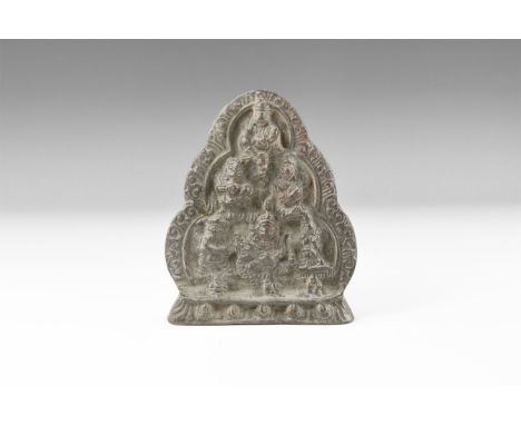 20th century AD. A bronze tongue-shaped plaque with pyramid of robed Bodhisattva figures, ledge and stand below.   402 grams,