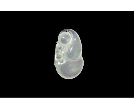 20th century AD. A carved jade pendant of a mouse and lungzhi mushroom.   9.23 grams, 36mm (1 1/2"). Acquired on the London a