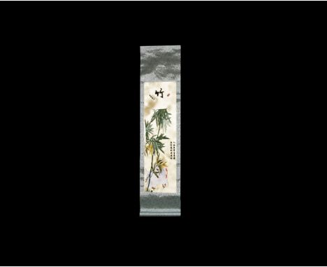 20th century AD. A silk scroll on a paper backing with embroidered silk scene of two white turkeys with a large bamboo plant 