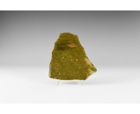 A slice of greenstone matrix with numerous areas of bright native copper, with an acrylic finish to prevent oxidation of the 