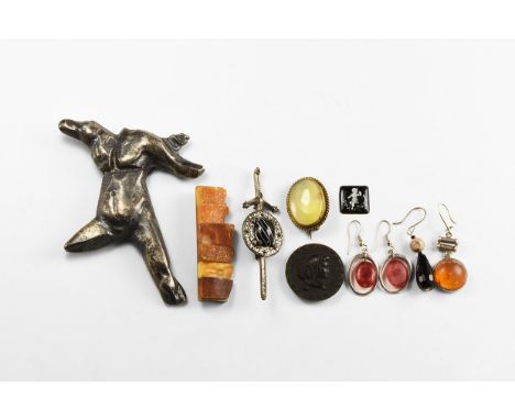 20th century AD. A mixed group of jewellery items comprising: a matched pair of silver-coloured metal earrings with red glass