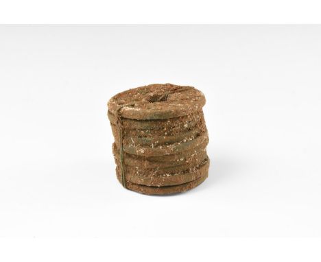 A stack of ten bronze undated archaistic cash coins.   200 grams, 36mm (1 1/2"). London private collection, acquired 1985-199