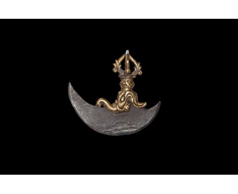 20th century AD. A brass ceremonial axe, or kartrika, handle formed as a vajra thunderbolt, knotted median bulb and makara he