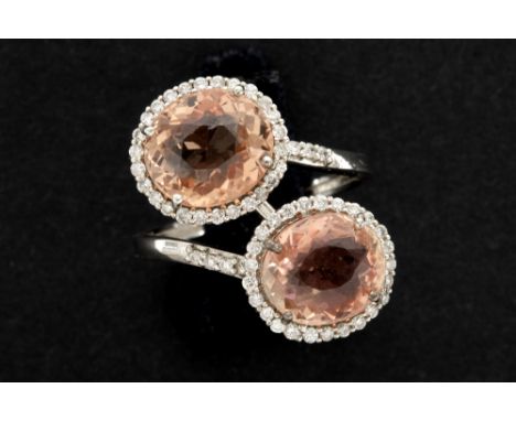 attractive ring in white gold (18 carat) with at least 7 carat of Morganite with a nice natural pink color and with ca 0,40 c