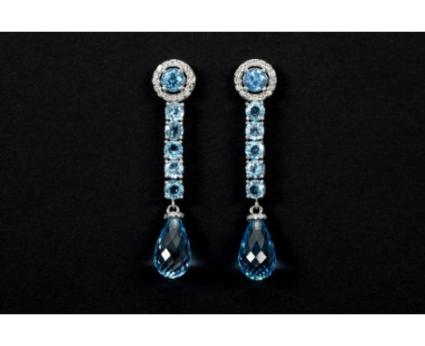 pair of elegant handmade earrings in white gold (18 carat) with more then 18 carat of light blue Topazes and ca 0,40 carat of
