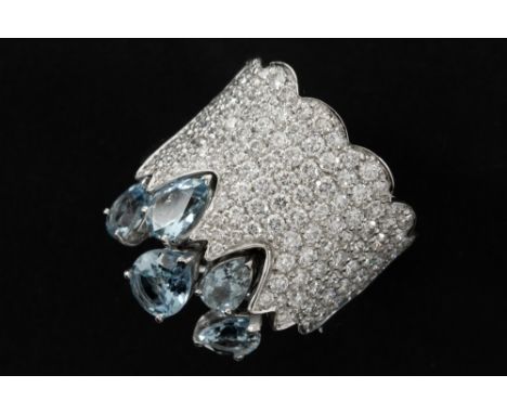 Robotti signed design ring in white gold (18 carat) with ca 4,50 carat of light blue Topaz and ca 3 of very high quality bril