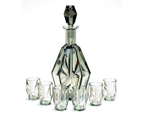 An Art Deco enamelled smoke glass liqueur set, facet cut, decorated with geometric design in silver, yellow, blue and orange,