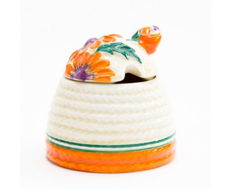 Clarice Cliff a Marguerite beehive honey pot, relief moulded and decorated in orange, green and purple, Bizarre, Newport mark