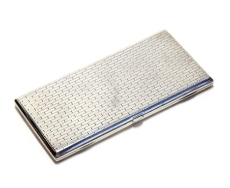 Omar Ramsden, an Art Deco style silver cigarette case, rectangular form with engraved brickwork design, the interior gilded, 