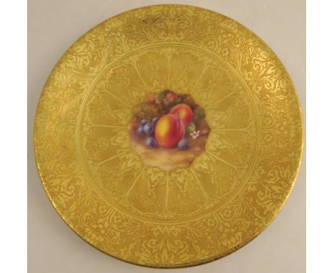 A Royal Worcester acid gilt plate, painted to the centre with fruit by H Price, signed, diameter 9.25ins - Good condition