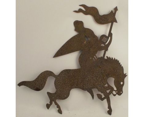 A sheet metal weather vane top, modelled as a knight on horseback carrying a pennant, height 24ins, width 23ins