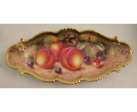 A Royal Worcester oval dish, with a shaped border decorated with hand painted fruit by Freeman, width 9.75ins - Good conditio