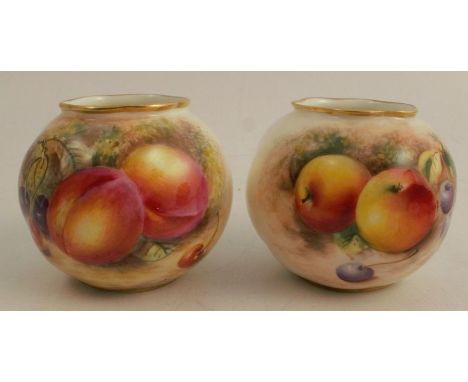 Two Royal Worcester wrythen vases, decorated with half round hand painted fruit by Freeman and Roberts, circa 1956, height 2.