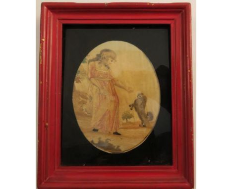 A 19th century oval tapestry picture on silk, of a young girl and her dog, maximum diameter 5.75ins