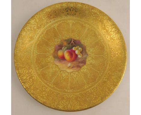 A Royal Worcester acid gilt plate, painted to the centre with fruit by H Price, signed, diameter 9.25ins&nbsp;- Good conditio