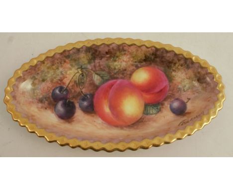 A Royal Worcester oval shaped dish, with a gadroon border decorated with hand painted fruit by Freeman, width 7.25ins - Good 