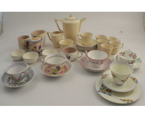 A Crown Ducal coffee set, together with a collection of Poole pottery and various cups and saucers