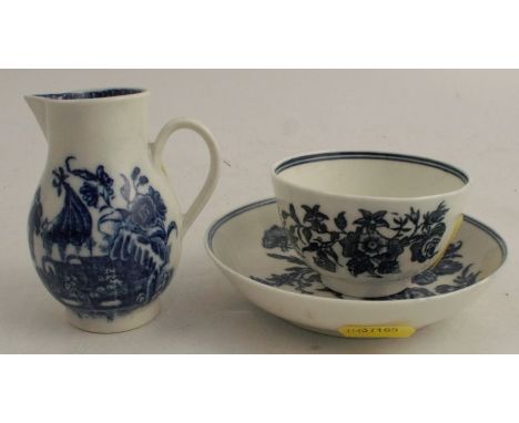A Caughley sparrow beak jug, decorated with a cormorant fisherman, together with a Caughley tea bowl and saucer, decorated wi