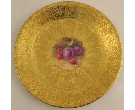 A Royal Worcester acid gilt plate, painted to the centre with fruit by H Price, signed, diameter 9.25ins - Good condition