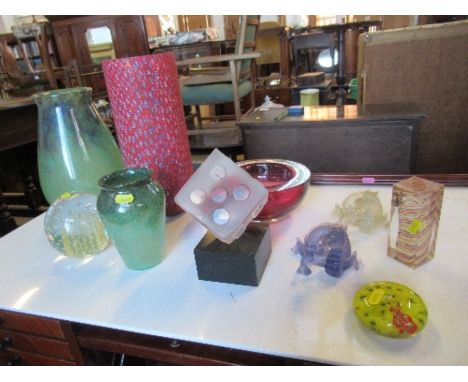 A collection of 20th century glass, to include two Daum dragons, paperweights, a Kosta Boda dice, millefiori vase height 12in