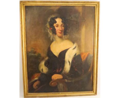 A 19th century oil on canvas, portrait of a woman, 36ins x 27.5ins