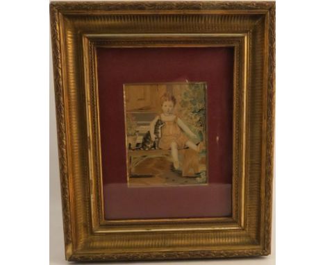 A 19th century tapestry picture on silk, of a young girl seated on a bench with her arm round her cat, 6.75ins x 5ins