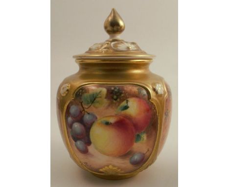 A Royal Worcester covered quarter lobed vase, decorated with half round hand painted fruit by Roberts, shape number H162, hei