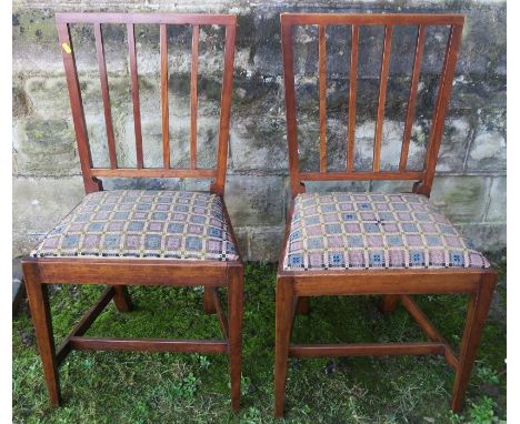 A pair of 18th century Georgian Hepplewhite style fruitwood dining chairs, having tapestry seats , raised on square tapering 