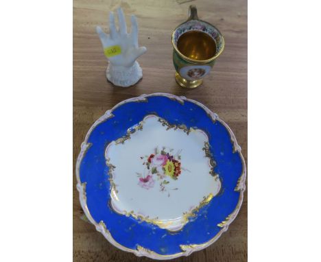 A Continental porcelain cup, painted with a portrait of a girl, restoration to handle, together with a 19th century English p