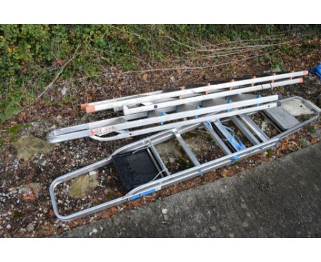 Four various aluminium folding step ladders, largest 203cm high  