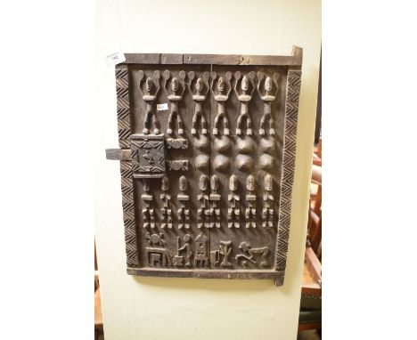 Carved African Dogon granary door, 52cm x 36cm  