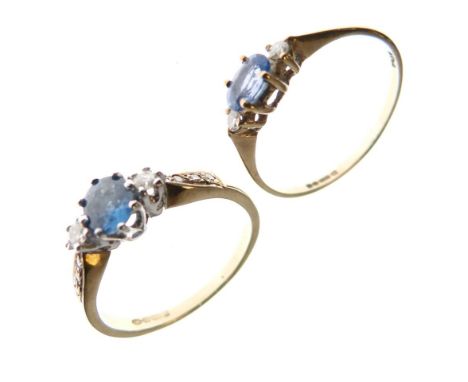 Two 9ct gold dress rings, one set central sapphire between two small diamonds, the other set a larger sapphire between white 