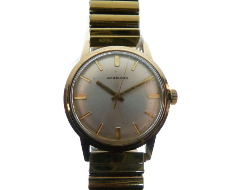 Garrard - Gentleman's yellow metal wristwatch, silvered dial with baton hour markers and centre seconds, manual wind movement