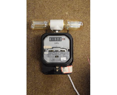 Upcycled light formed from an electric meter
