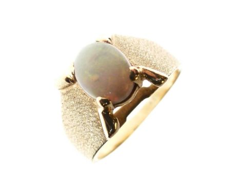 Yellow metal and opal dress ring set oval cabochon, the shank stamped 18k, size L, 6g gross approx  