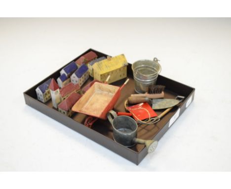 Quantity of small painted wooden buildings, together with tin bucket, trowel etc  