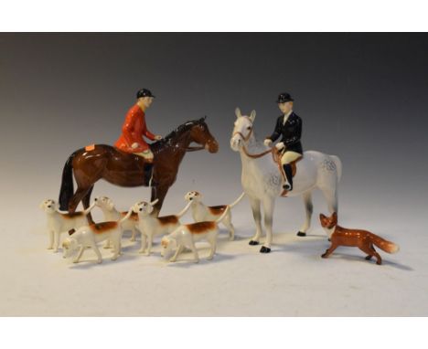 Beswick Huntsman and Huntswoman group comprising 1501, 1730, Foxhound 2265 second version (x2) Foxhound first version 941 etc