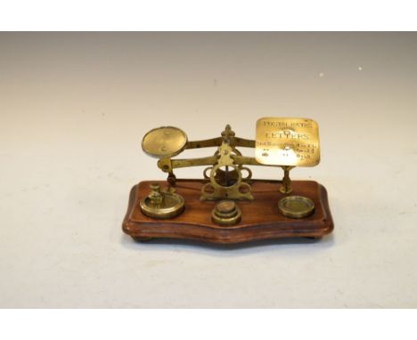 Set of brass and fruitwood postal letter scales with weights  