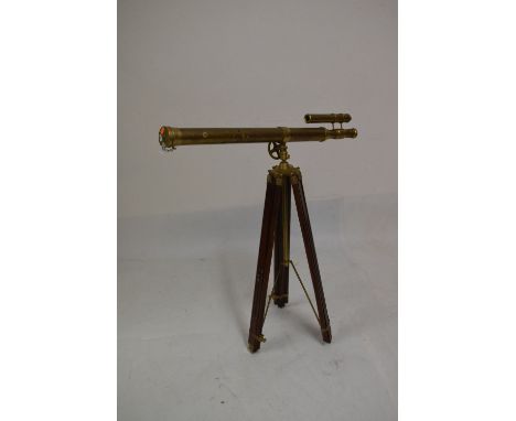 Reproduction brass telescope having a mahogany tripod  