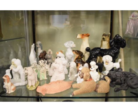 Quantity of ceramic model dogs, to include German Shepherd, Dalmatian, Old English Sheepdog etc  