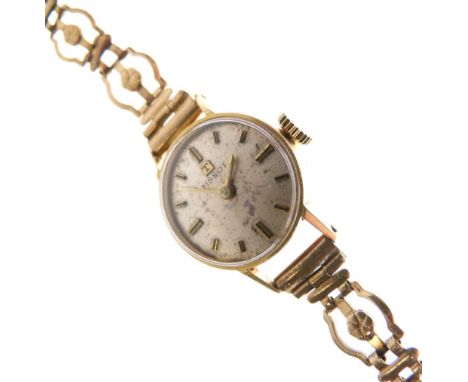 Tissot - Lady's 18ct wristwatch, silvered dial with baton hour markers, manual wind movement, 19mm excluding crown, pierced p