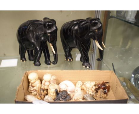 Collection of resin etc netsuke and a pair of ebonised elephants  