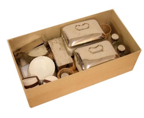 Contents of a vintage picnic basket having ceramic 'Coracle Brand' silver plated covered sandwich boxes, etc  