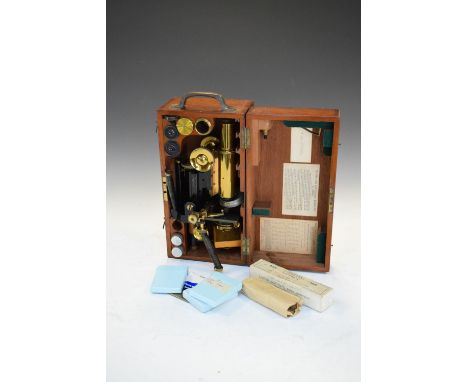 Early 20th Century brass and anodised microscope, James Swift &amp; Son, London, in mahogany case with eye-pieces and objecti