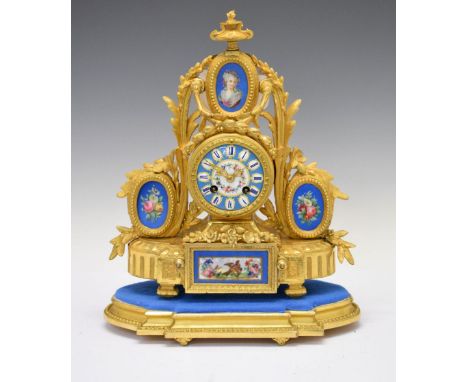 Late 19th Century French porcelain-mounted gilt metal mantel clock, with decorated cellular Roman dial beneath oval portrait 