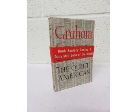 GREENE, Graham - The Quiet American - 1955, first edition, dust-wrapper, with original Book Society wraparound 