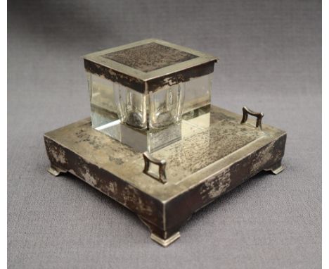 A George V silver desk standish, of square form, with an engine turned rim, Birmingham, 1930