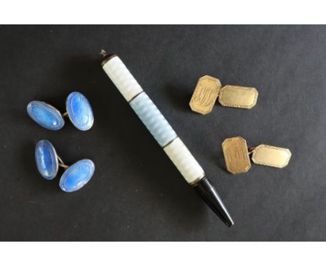 A two tone blue enamel propelling pencil together with a pair of blue enamel on silver cufflinks and a pair of 9ct gold cuffl